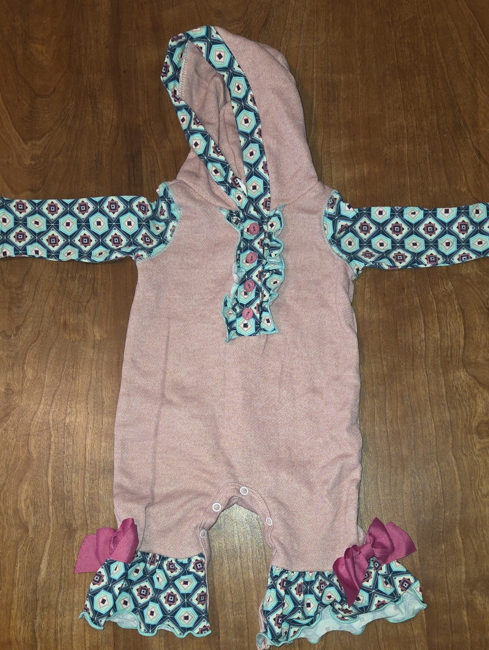 Ricrac & Rufflwa Hooded Pink Ruffle One-Piece Bodysuit with Geometric Trim